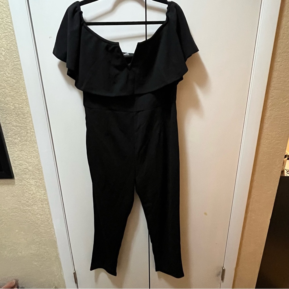 Chic Black Off-Shoulder Jumpsuit with Ruffle Detail - Picture 1 of 10